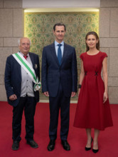 Syrian President Bashar al-Assad and the First Lady Asma al-Assad receive the participants in the international conferen