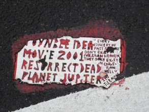 Toynbee tiles A Toynbee Tile is seen embedded into the pavement at a site in the Chelsea neighborhoo