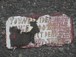 Toynbee tiles A Toynbee Tile is seen embedded into the pavement at a site in the Chelsea neighborhoo