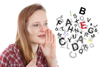 Kauderwelsch young woman talking gibberish or gobbledygook Copyright: xZoonar.com/AxelxBueckertx 6822221 ,model released