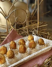 Eggs for dinner: breaded quail eggs in nests