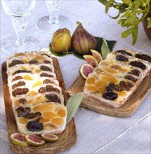 Typical French buffet: smoked terrine with dried fruits