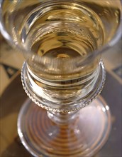 Yachting menu: glass of white wine