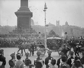 Coronation of King George VI.
The procession passes through Trafalgar Square as thousands of