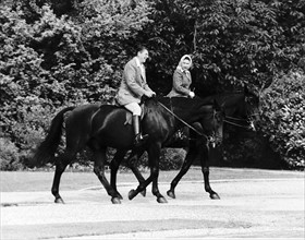Le reine Elisabeth II et le président Reagan à cheval
