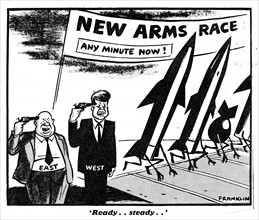 Ready, Steady Franklin cartoon 6th September 1961

A banner bearing the words "NEW ARMS RACE any