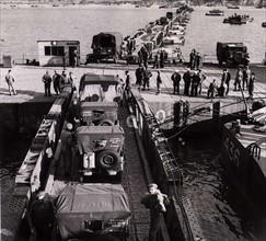World War II Invasion of France - Operation Overlord
Lorries and jeeps driving off the Mulberry
