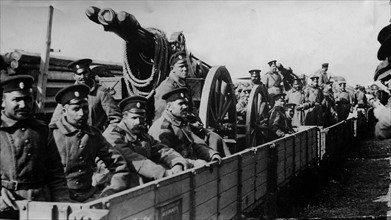 Balkans War November 1912
soldiers sitting in a carriage with huge guns and artillery on the way