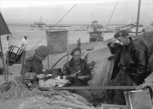 Members of the Army Logistics Corp seen here enjoying a cup of tea and a spot of lunch in between