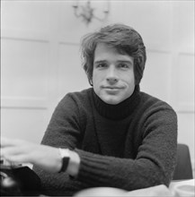 Warren Beatty, American actor, pictured in his London flat in 1968