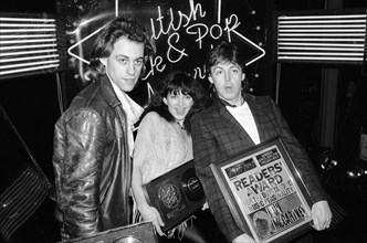 Kate Bush with fellow pop singers Bob Geldof and Paul McCartney at The British Rock and Pop Awards,