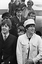 The Beatles return to England