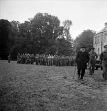 British Prime Minister Winston Churchill pictured on his visit to Normandy in Northern France, six