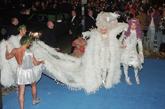 Elton John and David Furnish arriving at Elton's 50th birthday party at Hammersmith Palais. 6th