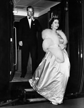 Her Majesty Queen Elizabeth II, followed closely behind by her husband Prince Philip, the Duke of