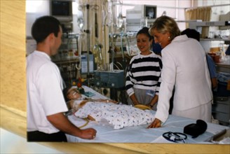 Diana, Princess of Wales pays a visit to two year old Marie Jan Murray at Great Ormond Street