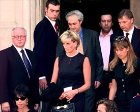 Princess Diana leaves a memorial service for slain Italian fashion designer Gianni Versace at