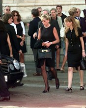 Princess Diana leaves a memorial service for slain Italian fashion designer Gianni Versace at