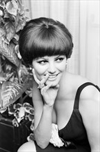 Claudia Cardinale, Italian film actress aged 24 years old, pictured at her hotel in London,