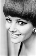 Claudia Cardinale, Italian film actress aged 24 years old, pictured at her hotel in London,