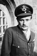 Actor David McCallum on the film set during filming of 'Colditz', the BBC TV series. He played the