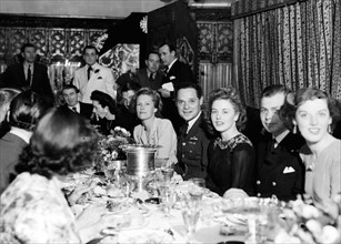 Douglas Bader and his wife at party, following the liberation of Colditz, where he was a POW.  29th