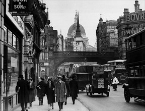 London circa 1930  Street scene at Ludgate Circus with St Paul's Cathedral in the background