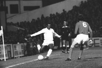 Brazilian football star Pele in action for Santos against Fulham, March 1973