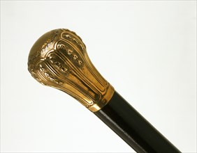Cane with balloon shaped handle