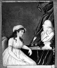 Femme assise devant le buste de son mari