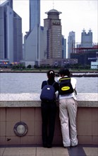 Students, boy and girl on the Bund, Shanghai, China