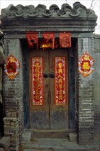 Une porte dans le quartier des "Hutong" (ruelles) à Pékin