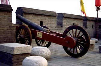Ancient weapon iron cannon on the Pingyao City Wall