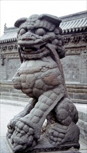 Temple de Shanhuaya, lion de pierre sculpté