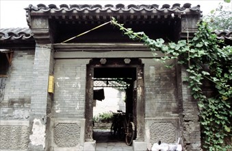 Quartier des "Hutong" (ruelles) à Pékin, portail d'entrée de la cour