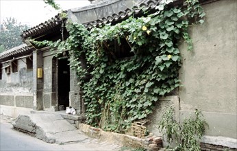 Quartier des "Hutong" (ruelles) à Pékin, portail d'entrée de la cour