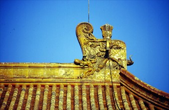 Dragon ornament on the ridge of the roof, the Forbidden City
