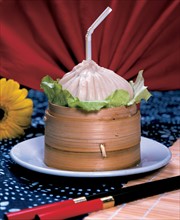 Traditional Chinese food in bamboo steamer