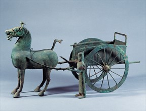 A guard with bronze chariot and horse