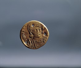 Romain gold coin discovered in China along the Silk Road.