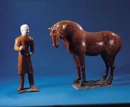 Cheval et cavalier en terre cuite à glaçure trois couleurs. Dynastie Tang.