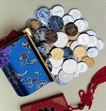 The coins,embroidered purse and Chinese tie