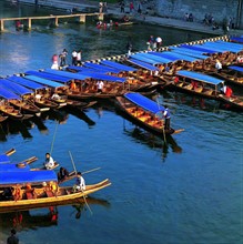 the boats by the river at the north gate of Ancient Phoenix City,Hunan Province,China