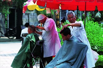 The street barbers in Shenyang,Liaoning Province,China