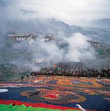 Buddha's portrait unfolding to celebrate Shouton Festival in Drepung Monastery, Tibet,China