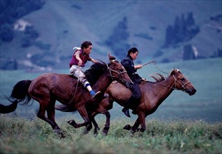 Boys riding horse
