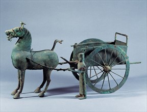 A bronze guard with a bronze chariot and horse from Han Dynasty of ancient China