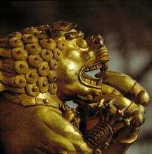 A copper lion statue in Forbidden City,Beijing,China