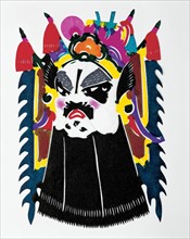 Papercut in the shape make-up of Peking opera, China