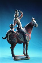 A painted figurine of a hunter on horse from the Tomb of Princess Yongtai of Tang Dynasty,Shaanxi,China